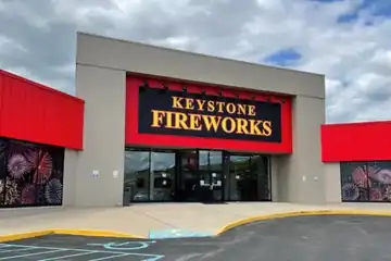 Keystone Altoona storefront with red awnings and the front lot